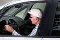 Senior man driving car Royalty Free Stock Photo