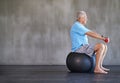 Senior man, dumbbells and exercise with ball for fitness, rehabilitation or physiotherapy at gym on mockup space Royalty Free Stock Photo