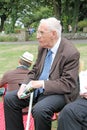 Senior man eating in park