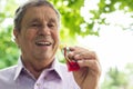 Senior man eating a protein bar Royalty Free Stock Photo