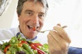 Senior Man Eating Salad