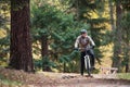 A senior man with electrobike cycling outdoors on a road in park in autumn. Royalty Free Stock Photo