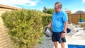 A senior man enjoying gardening Royalty Free Stock Photo