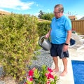 A senior man enjoying gardening Royalty Free Stock Photo