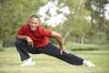 Senior Man Exercising In Park