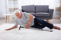 Senior Man Fallen On Carpet Royalty Free Stock Photo