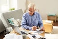 Senior Man Filing Tax Report at Home Royalty Free Stock Photo