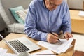 Senior Man Filling Application Form at Home Royalty Free Stock Photo