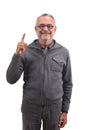 Senior man with finger in the shape of number Royalty Free Stock Photo