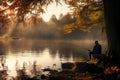 Senior man fishing on the lake on sunny autumn evening. Elderly fisherman spending time in nature. Leisure and hobbies for retired Royalty Free Stock Photo