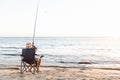 Senior man fishing at sea side Royalty Free Stock Photo