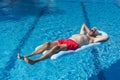 Senior man floating on water Royalty Free Stock Photo