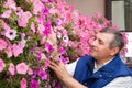 Senior man florist working in the garden Royalty Free Stock Photo