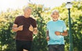 Senior man, friends and running in park for exercise or outdoor training together in nature. Happy mature people in body Royalty Free Stock Photo