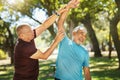 Senior man, friends and stretching in nature for workout, exercise or outdoor training together. Mature male person or Royalty Free Stock Photo