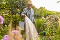 Senior man in the garden at summer day Royalty Free Stock Photo