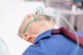 Senior man getting treatment for lungs infected with covid19 Royalty Free Stock Photo