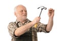 Senior man hammering Royalty Free Stock Photo