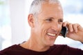 Senior, man and happy with phone call in home for communication, discussion and mobile chat on weekend. Elderly, person Royalty Free Stock Photo