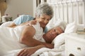 Senior Man Having Difficulty In Sleeping In Bed With Wife Royalty Free Stock Photo