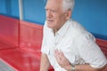 Senior man having heart attack Royalty Free Stock Photo