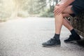 Senior man having knee pain while exercising, sports injuries concept Royalty Free Stock Photo