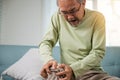 Senior man having painful knee pain after ligament surgery Royalty Free Stock Photo