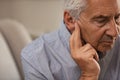 Senior man with hearing problems Royalty Free Stock Photo