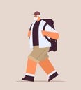 senior man hiker traveling with backpack active old age physical activities concept full length Royalty Free Stock Photo