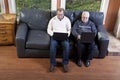 Senior man and his son using laptop computer Royalty Free Stock Photo