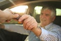 Senior man holding a car key. Royalty Free Stock Photo