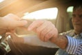 Senior man holding a car key. Royalty Free Stock Photo