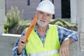 senior man holding construction level Royalty Free Stock Photo