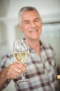 Senior man holding glass of wine Royalty Free Stock Photo