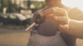 Senior man holding key car. Focus of hand. Royalty Free Stock Photo