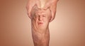 Senior man holding the knee with pain. Collage. Concept of abstract pain and despair. Royalty Free Stock Photo