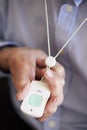 Senior Man At Home Using Distress Alarm Call Button Royalty Free Stock Photo