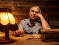 Senior man in homely interior Royalty Free Stock Photo