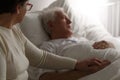 Senior man in hospital bed Royalty Free Stock Photo