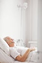 Senior Man in Hospital Bed Royalty Free Stock Photo