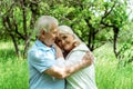 Senior man hugging happy wife with grey hair Royalty Free Stock Photo