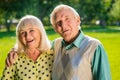 Senior man hugging woman.