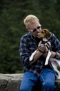 Senior Man Kissing Beagle Royalty Free Stock Photo