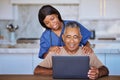 Senior man, laptop and black caregiver or home nurse helping patient with social media, communication and internet Royalty Free Stock Photo