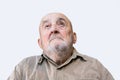 senior man looking above isolated on white background Royalty Free Stock Photo