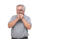 Senior man looking through magnifying glass and smiling isolated on white background Royalty Free Stock Photo