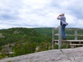 Senior man looking over a cliff