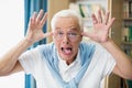 Senior man making faces Royalty Free Stock Photo