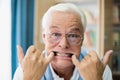 Senior man making faces Royalty Free Stock Photo