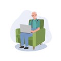 Senior man and Modern Technology concept. Grandpa Using Laptop on Couch for Online Browsing, Web Surfing. Enjoying Digital World